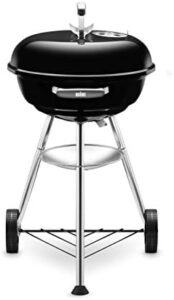Here is the optimized meta description:

"Compact Weber charcoal grill with porcelain-enamelled lid and bowl, tripod stand and wheels. Perfect for small spaces, cook up to 47cm of delicious BBQs."