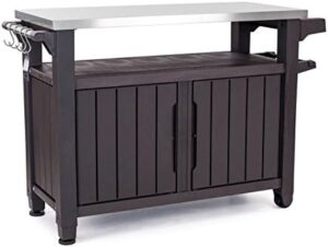 Discover the Keter Unity XL storage cabinet with stainless steel top, perfect for outdoor patios, kitchens, or bars. Store BBQ accessories and keep them organized with hooks. Compact design fits any space.