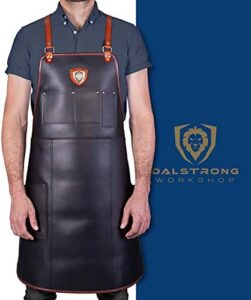 Upgrade your kitchen with the DALSTRONG Professional Chef Apron, featuring top-grain leather and 5 storage pockets. Plus, towel & tong loops and adjustable harness straps for comfort. Perfect for BBQ and butcher enthusiasts alike!