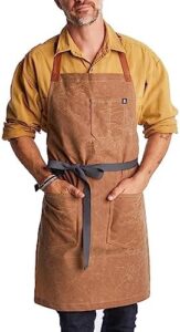 Here is your optimized SEO meta description:

"Upgrade your kitchen with Hedley & Bennett's Waxman apron, featuring durable waxed cotton and adjustable neck strap. Perfect for chefs and home cooks alike!"