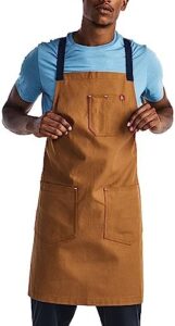 "Transform your cooking experience with Hedley & Bennett's Crossback Apron, featuring adjustable straps and multiple pockets for organization. Ideal for serious home cooks."