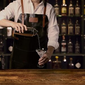 Elevate your style with Theodore's premium leather aprons, featuring a crossback design and spacious pockets perfect for the modern gentleman.
