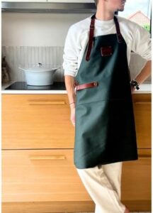 Protect your kitchen with the Maison Thuret 100% Natural Leather Apron, providing excellent protection against heat, splashes, and cuts. Sturdy genuine leather construction ensures durability. Perfect for men and women cooks.