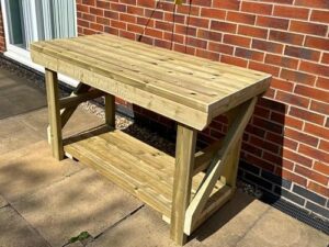 Here is the meta description:

"Compact and versatile wooden workbench for indoor or outdoor use. Features a single shelf perfect for DIY projects, potting plants, or BBQing. Compact 5ft size makes it ideal for small spaces."