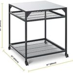 Transform your outdoor cooking with the Ooni Large Modular Pizza Oven Table, a 31x31x35 Inch stainless steel grill stand and barbecue cart. Cook like a pro with this versatile pizza station.
