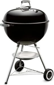 Discover the perfect blend of classic style and functionality with this 57cm black charcoal kettle and chimney starter combo, ideal for outdoor cooking enthusiasts.