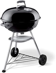 Discover the Weber Compact Charcoal BBQ, a 57cm black grill perfect for small outdoor spaces, complete with grill cover and compact design.