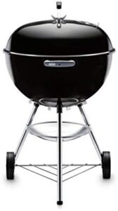 Explore the art of outdoor cooking with Weber's Bar-B-Kettle Charcoal Grill, featuring a 57cm grill area, porcelain-enamelled lid and bowl, and chromed grill grate. Perfect for BBQ enthusiasts!