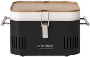 Discover the portable perfection of Everdure CUBE Charcoal Grill, featuring a tabletop design, prep board, and storage tray. Compact and lightweight for beach, patio, or camping adventures, with 12-month warranty.