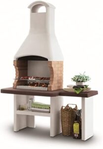 Enhance your outdoor gatherings with Jesolo 2's charcoal BBQ grill and side table, featuring a durable stone design by Palazzetti. Perfect for garden use, enjoy quality cooking and ample space.