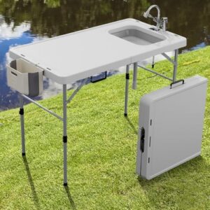 Discover the ultimate camping companion - Ergmaster's Fish Cleaning Table with sink and sprayer. Perfect for picnic or patio use, this portable station includes a fish cleaning kit for effortless meal prep.