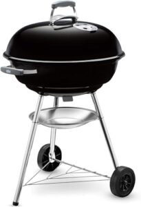 Master the art of outdoor cooking with the Weber Compact Charcoal BBQ, a portable and versatile grill perfect for small gatherings. Ideal for camping or backyard use, this 57cm charcoal BBQ is easy to handle and comes with a chimney starter included.