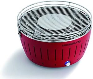 Here is the optimized SEO meta description:

"Upgrade your outdoor BBQs with this complete XL Starter Kit. Includes LotusGrill charcoal, sausage tongs and lighting gel, plus a transport bag for easy portability. Perfect for smoke-free grilling at home or on-the-go."