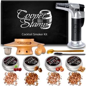 Elevate your Old-Fashioned game with the Cooper Stamp Cocktail Smoker Kit, featuring 4 wood chip flavors and a torch for perfect smoky results. Perfect gift for whiskey lovers, dads, husbands or brothers.